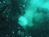 Recent Lava Bomb Cools, Sputters Underwater