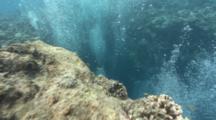 Pov Shot Revealing Entrance To Underwater Cave And Divers Bubbles