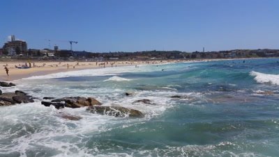 Bondi Beach or Bondi Bay is a popular beach on a hot summers in Sydney, Australia. Bondi is one of Australia's most popular beaches.