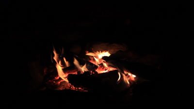  Buring wood on fire outdoor camping campfire at night