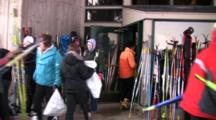 American Birkebeiner, Skiers Coming Out Of Lodge, Pre-Race, Skis Lined Up Waiting