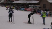 American Birkebeiner, Racers Crossing Finish Line, Exhausted, Getting Help From Race Officials