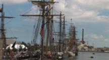 Masts, Rigging Of Tall Masted Sailing Ships, American Flag, Zoom To Pier View