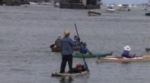Canoes, Kayaks,  Man Standing, Paddling In Lake Michigan Harbor