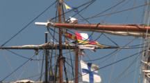 Masts And Rigging Of Tall Masted Sailing Ships Anchored In Harbor