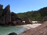 Beach And Granitic Rocks On La Digue Island