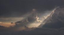 Aerial Sun Streaking Through Building Storm Clouds